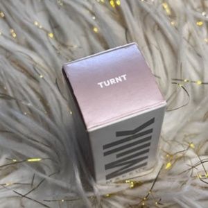 Milk makeup highlighter shade turnt
